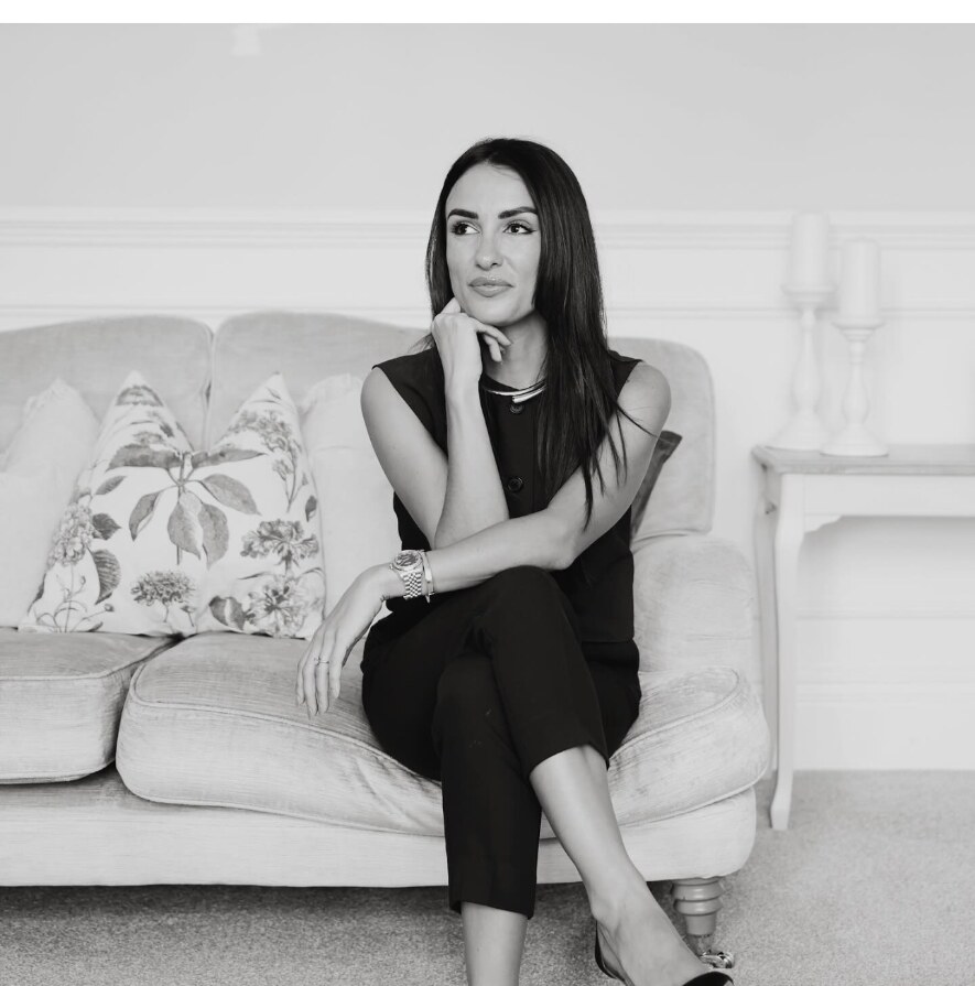 Christina Niblock, psychotherapist, seated in a calm therapy room